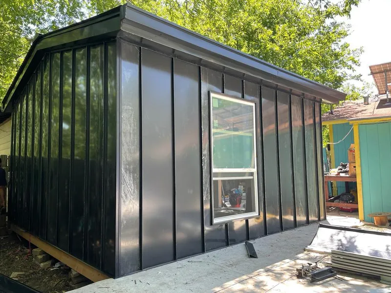 Black standing seam metal wall panels for Roof Inspection in Westwood Lakes